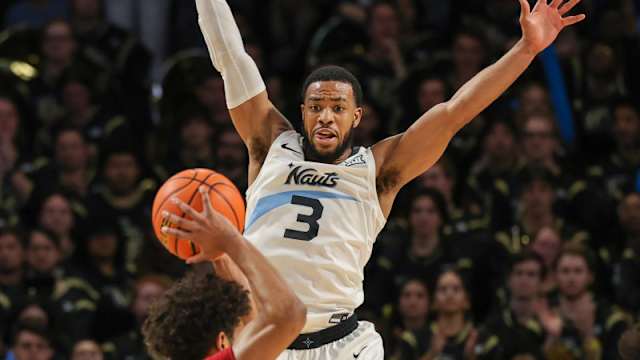 Mar 2, 2024; Orlando, Florida, USA; UCF Knights guard Darius Johnson (3) defends Iowa State Cyclones guard Curtis Jones (5) during the second half at Addition Financial Arena. Mandatory Credit: Mike Watters-USA TODAY Sports